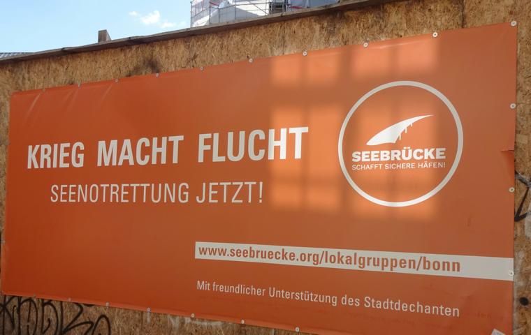 am Bauzaun des Bonner Münsters